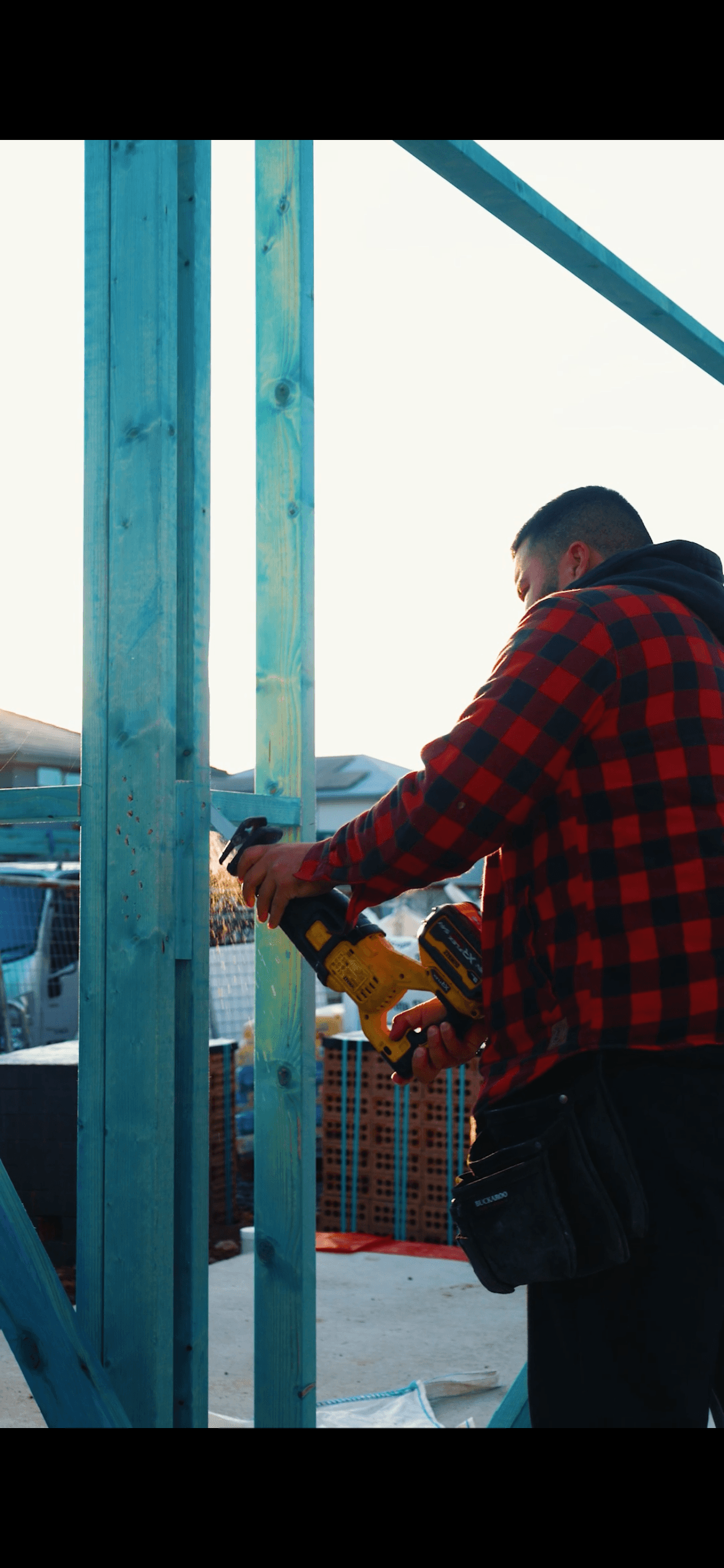 Oceanfront modern house on rocky cliff at dusk, Tidewatch Retreat