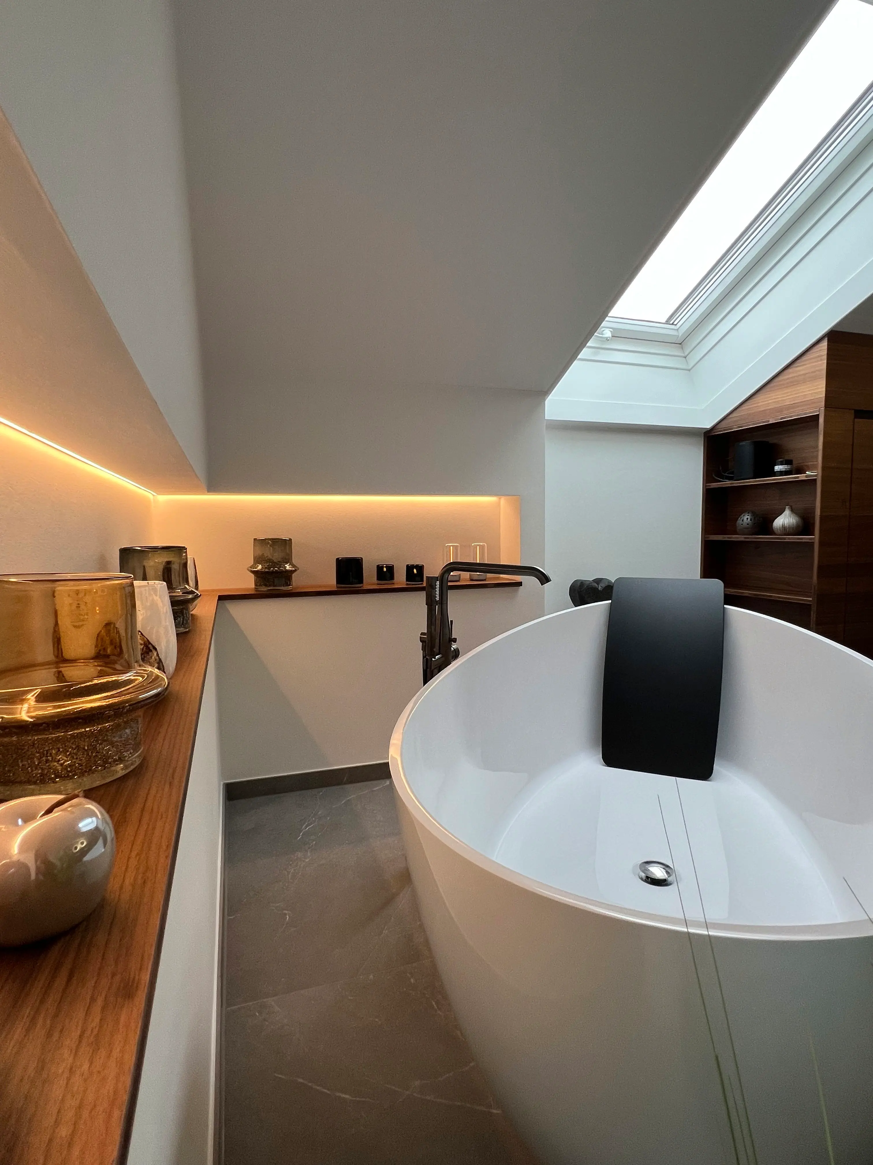 brown wooden bed frame with white and brown bed linen