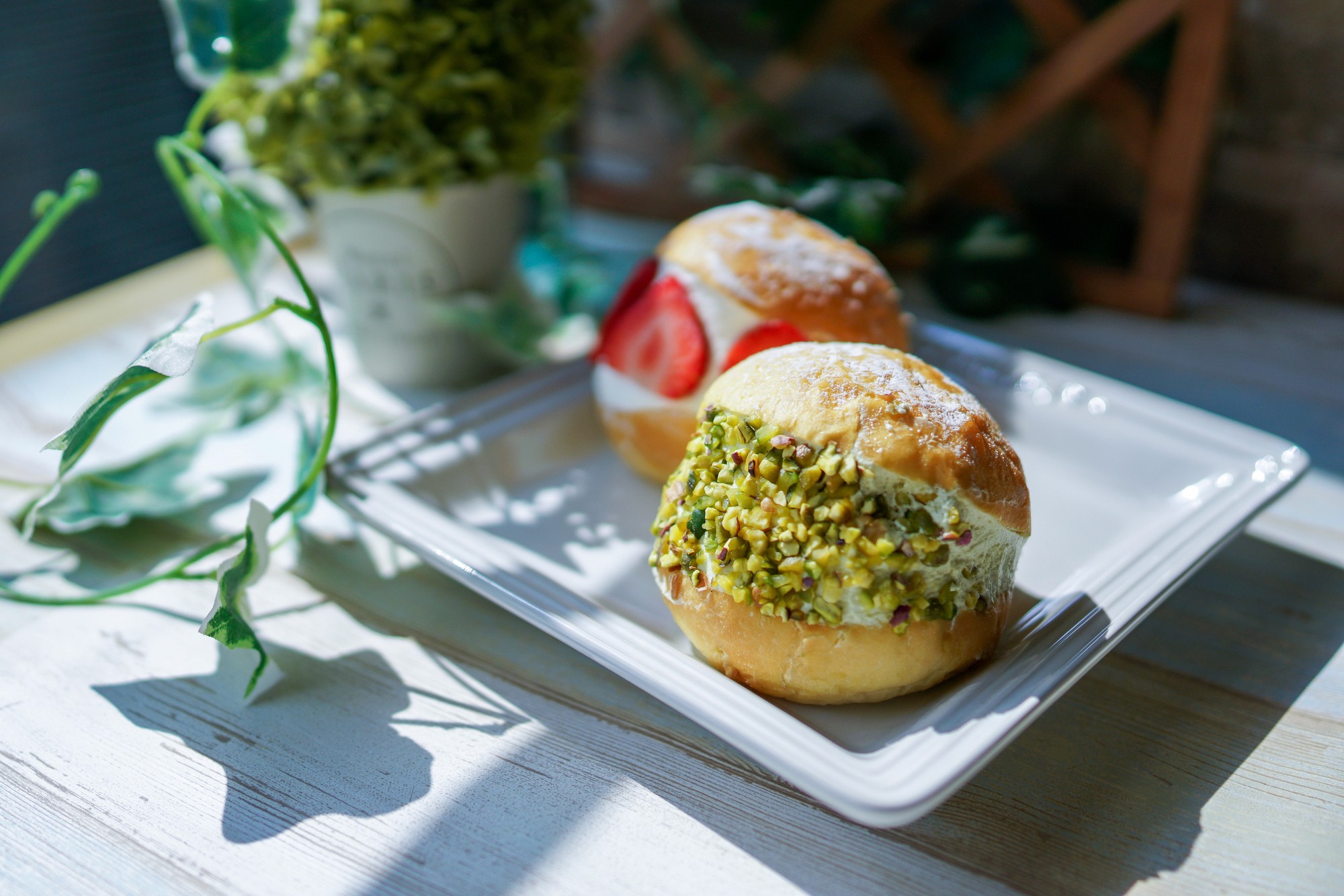 a person is holding a bowl of ice cream