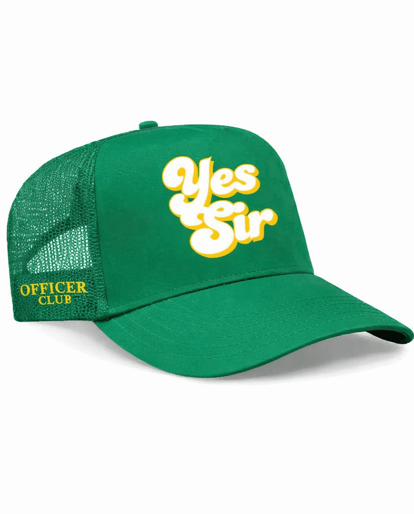 Green cap with 'Yes Sir' in yellow on a white background