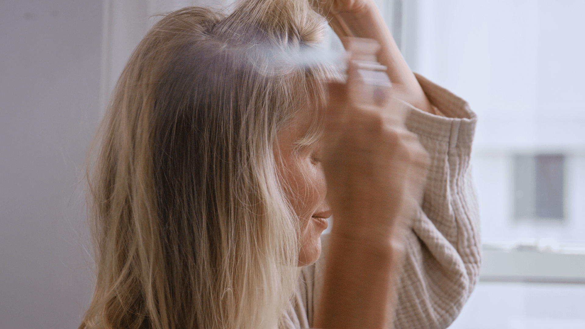 Celebrity Hairstylist Bridget Brager demonstrates how to use Rodan + Fields dry shampoo