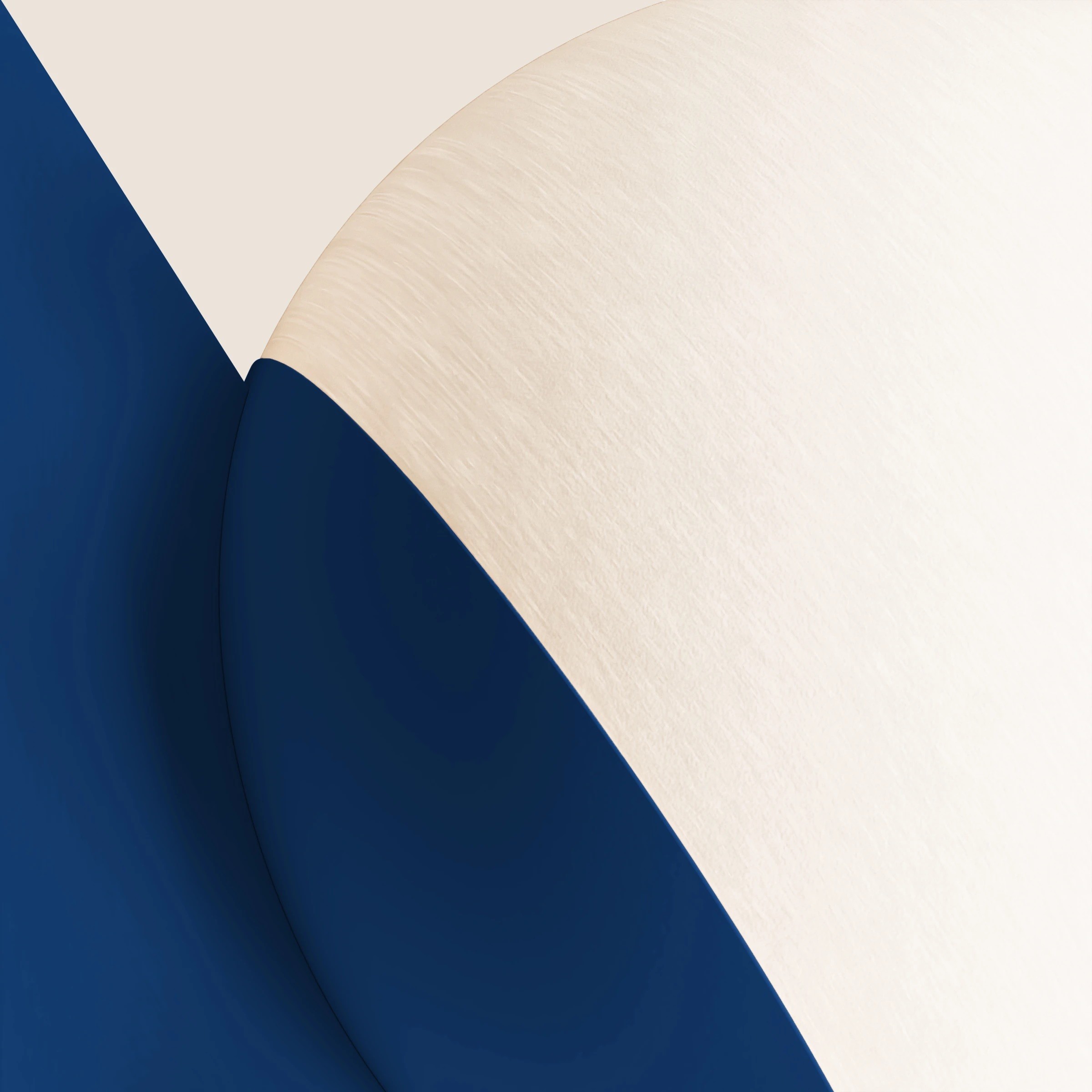 Close-up of a navy triangle edge meeting a textured cream globe
