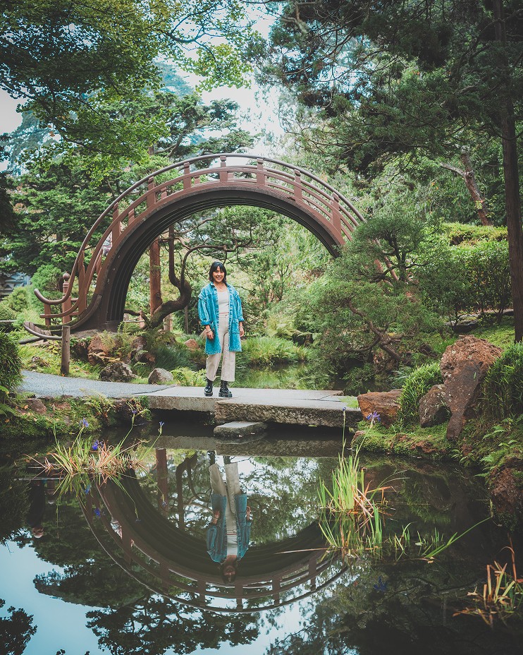 Priscilla Woo in a serene garden