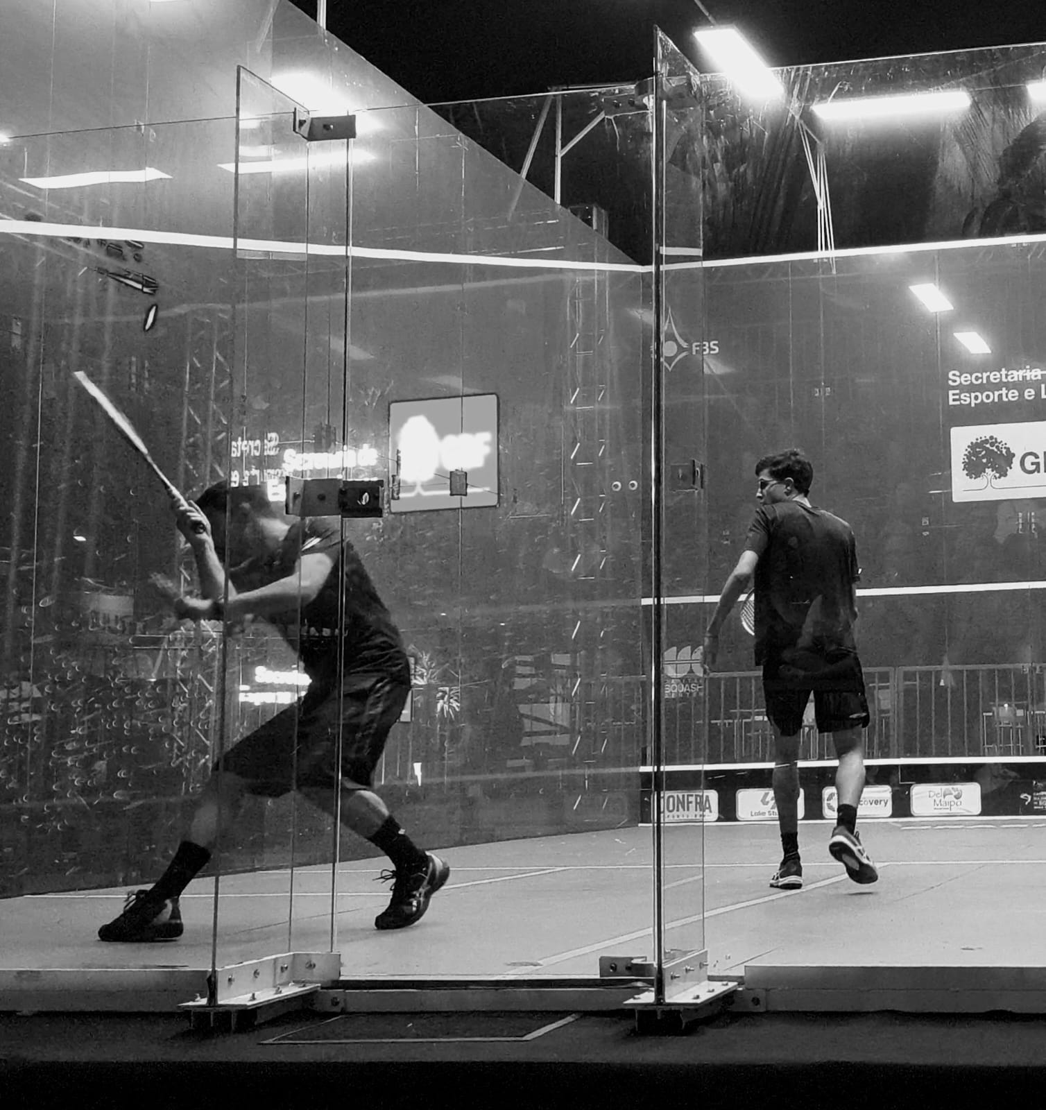 Drone shot of a running track at night