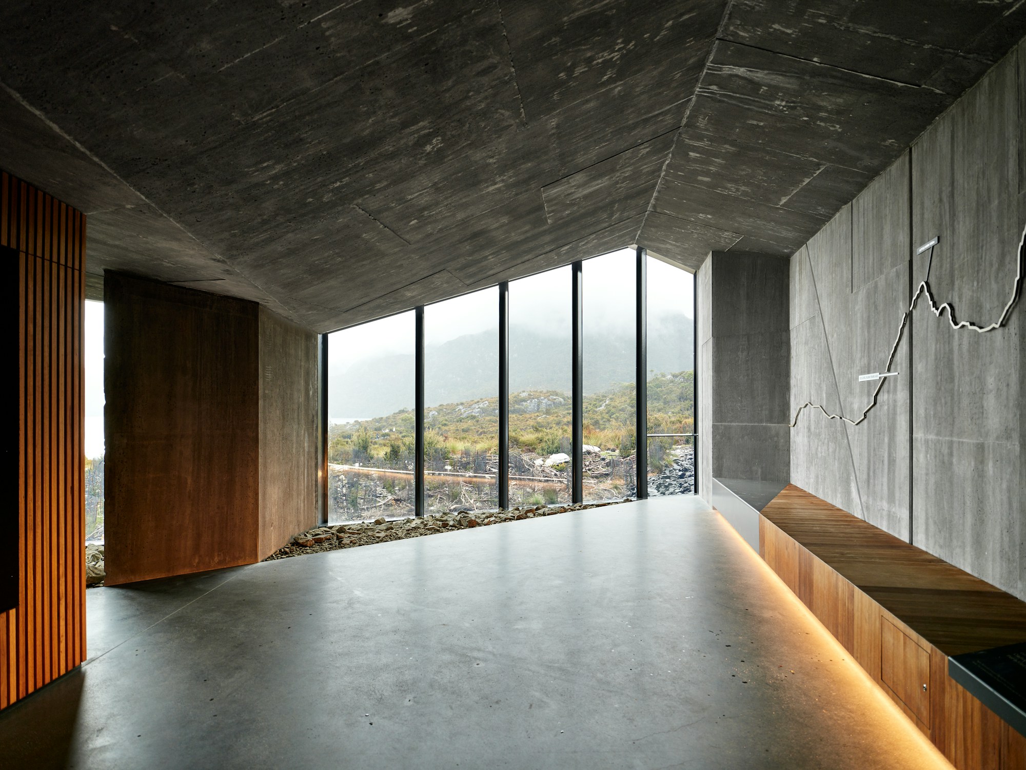 Concrete living room with a wide view of the hills