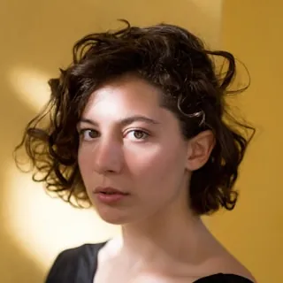 Woman with a yellow background