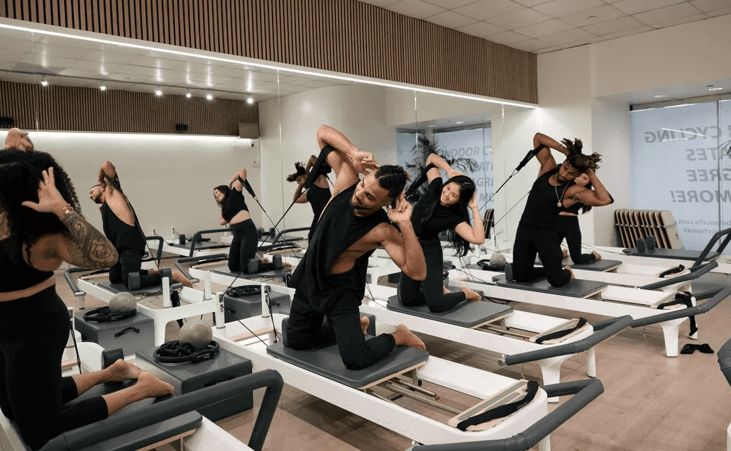 Group reformer Pilates class at Body Balance Hawaiʻi