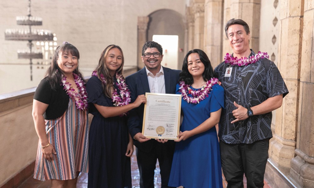 ewa makai students, their teachers, and councilmember Tulba pose with the Honor certificate.