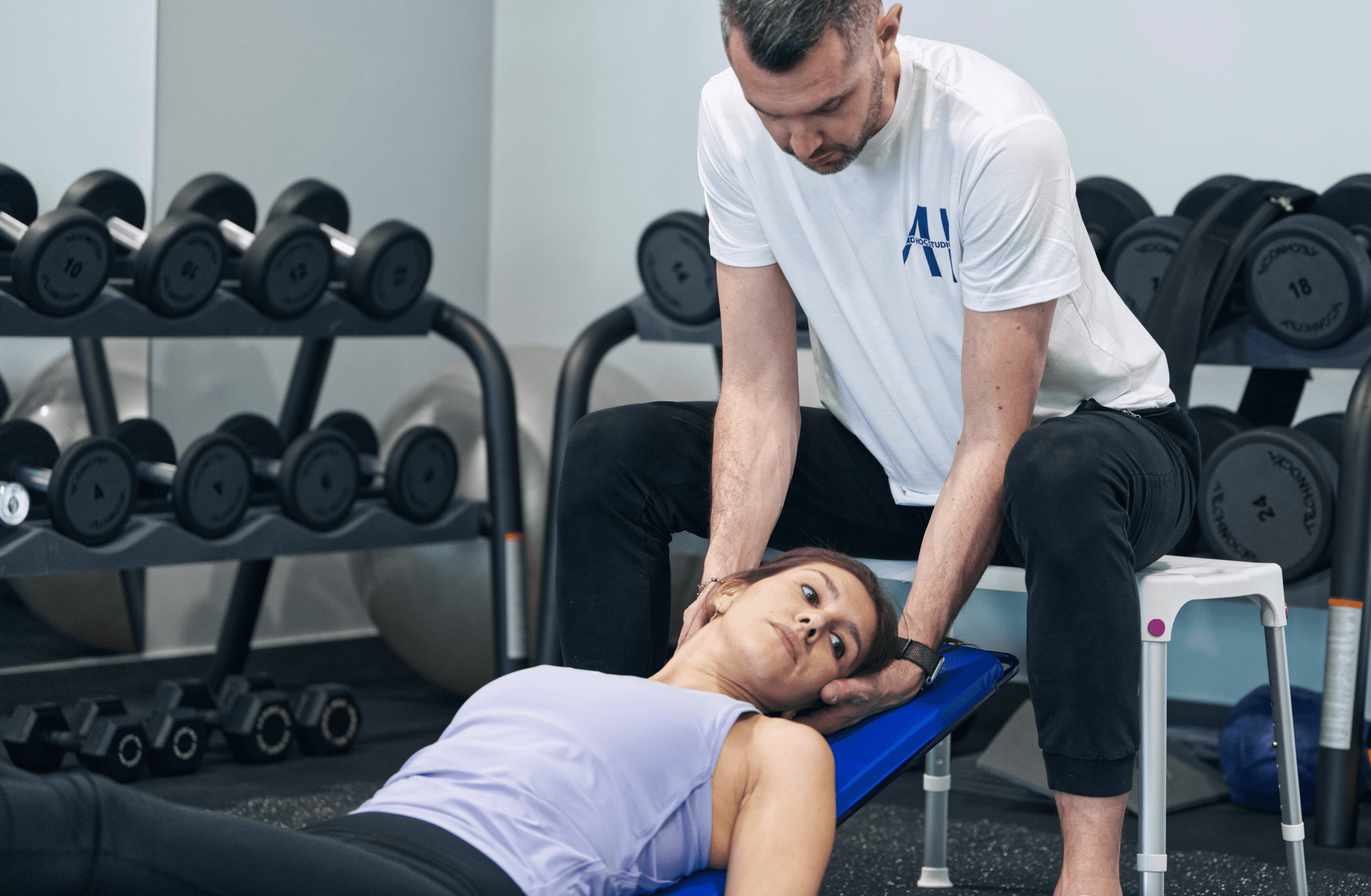 Futuristic glass tablet displaying a glowing blueprint-like interface against a dark background. It conveys a sleek, modern, and high-tech aesthetic.