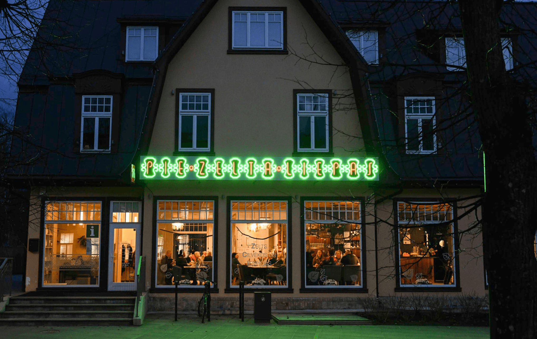 an interior of a fine dining restaurant with focused shot on the table with the plates and glass has been served