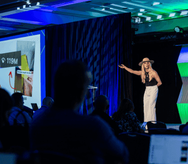 A Man Talking using Microphone in the Conference Room