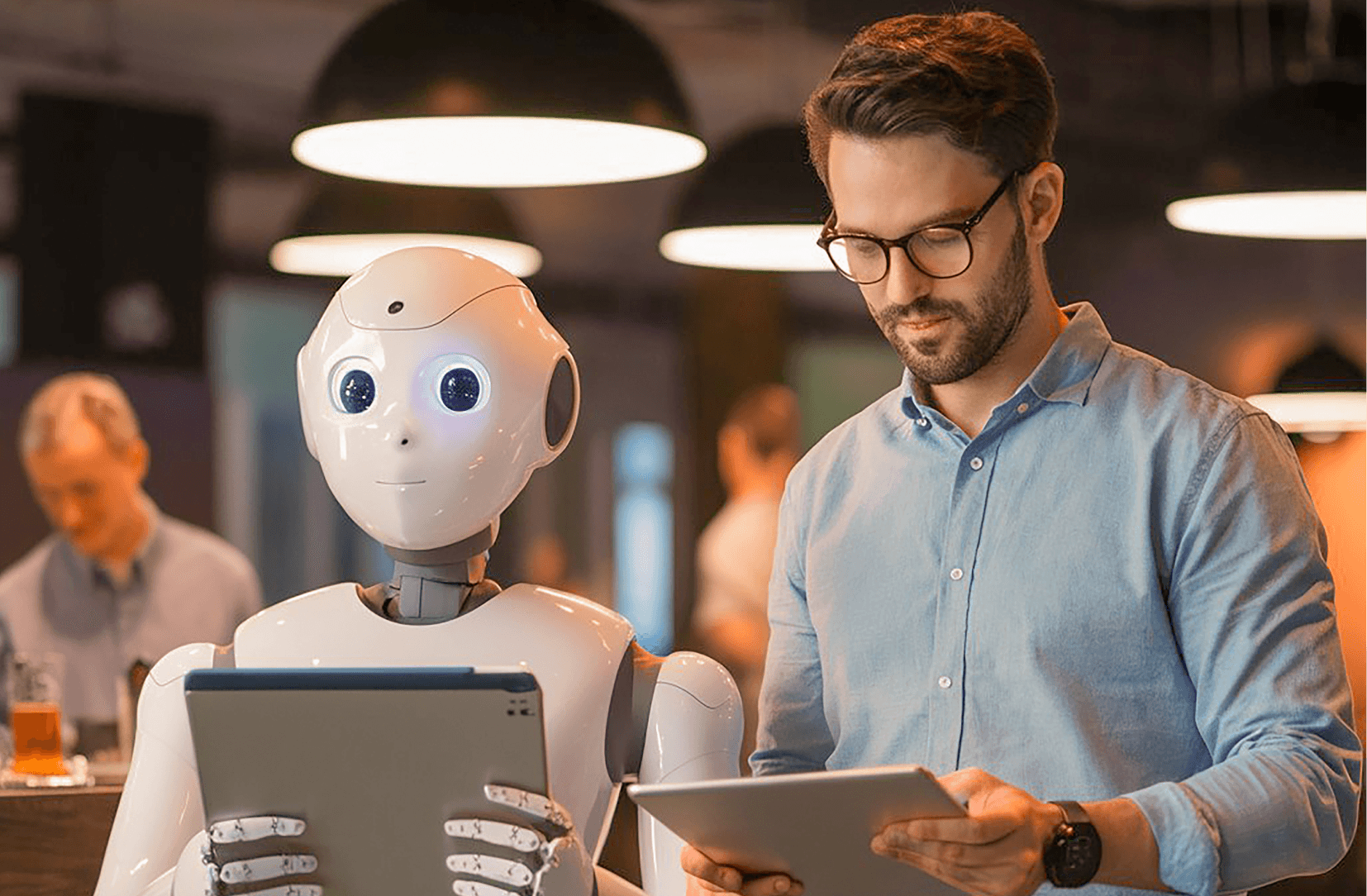 Man working with robot