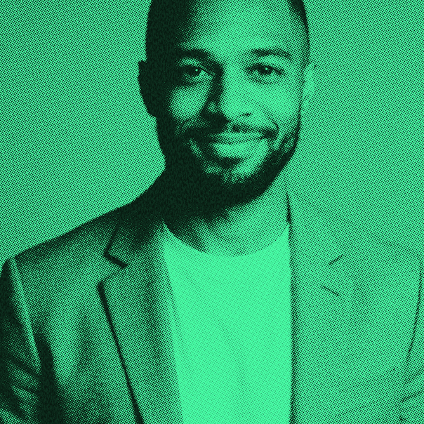 Smiling male team member