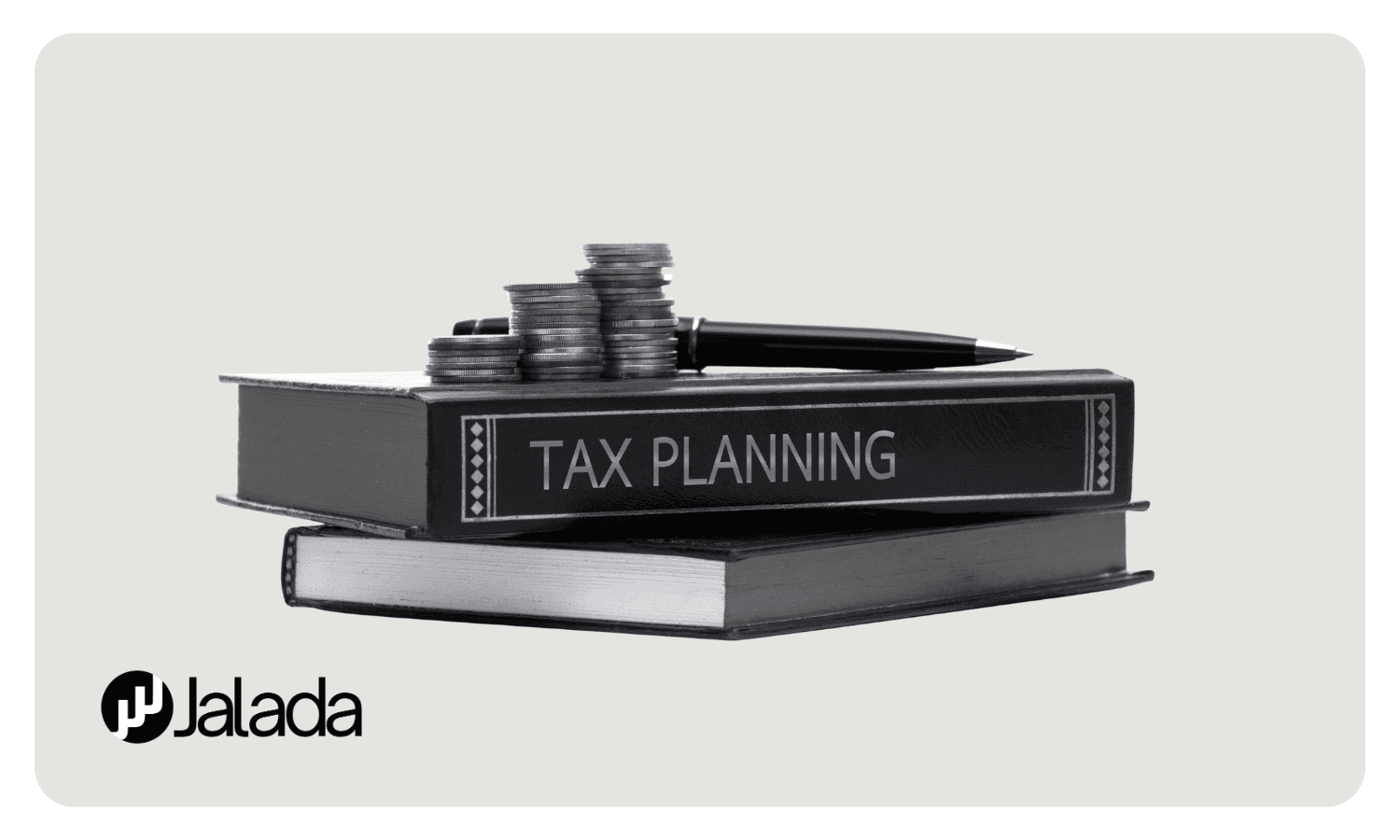 Tax Planning Books with coins and Pen