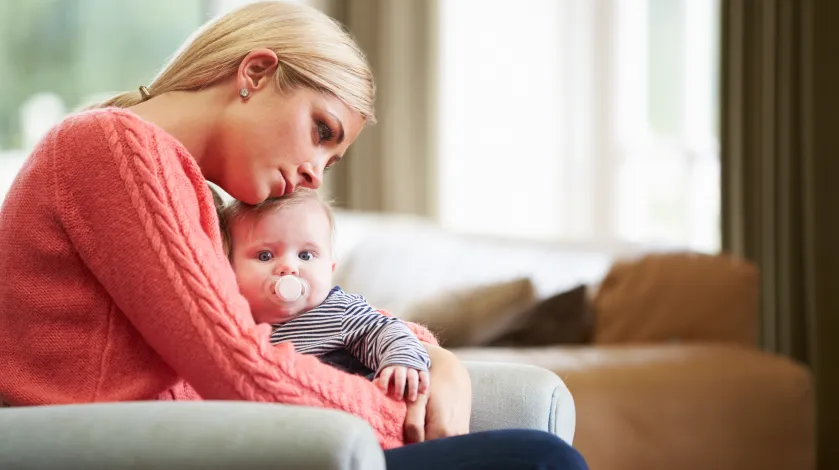 A mother and her son participate in a prenatal and postpartum support therapy session in Dallas