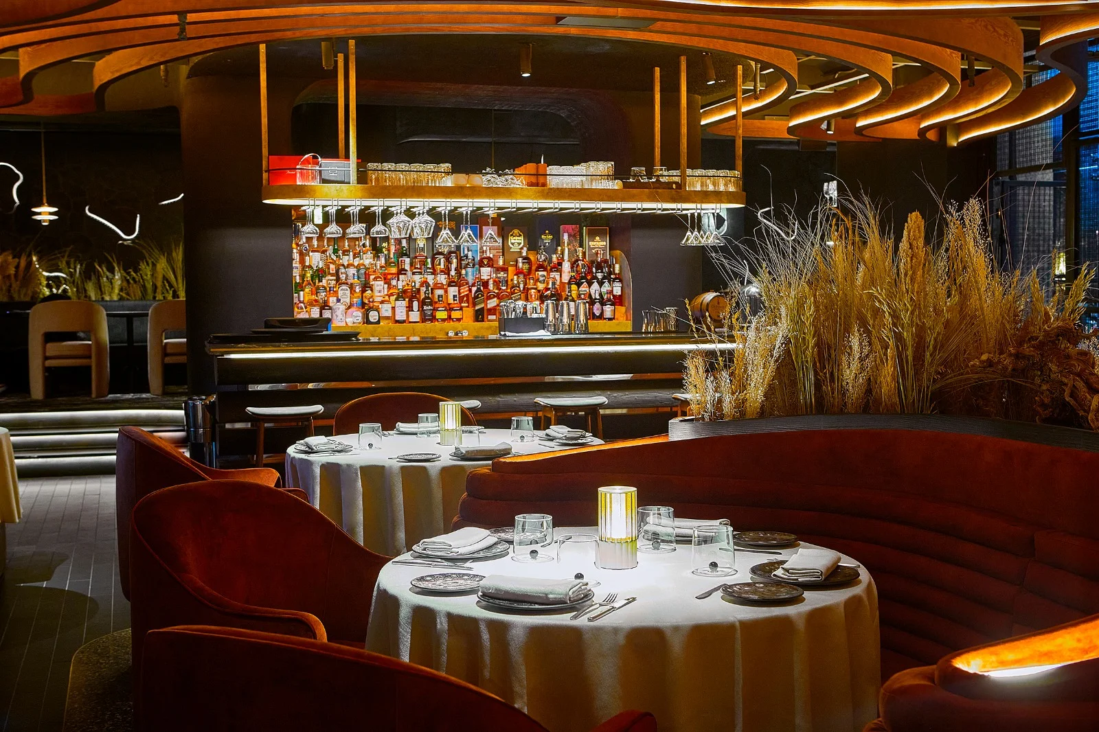 A vintage race car with blue, orange, and white livery