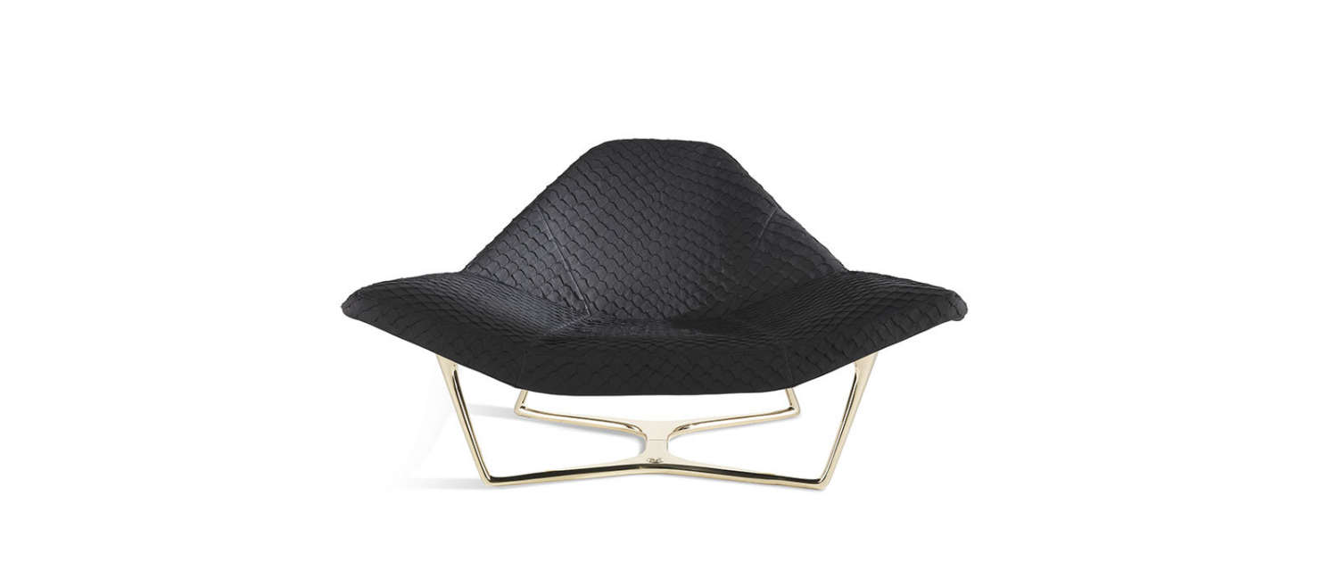 husband and wife working happily on a laptop