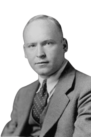 A classic black-and-white portrait of a serious-looking man in a suit and polka-dot tie, conveying professionalism and mid-20th-century style. The image has a formal, vintage quality, suitable for historical, biographical, or academic contexts.