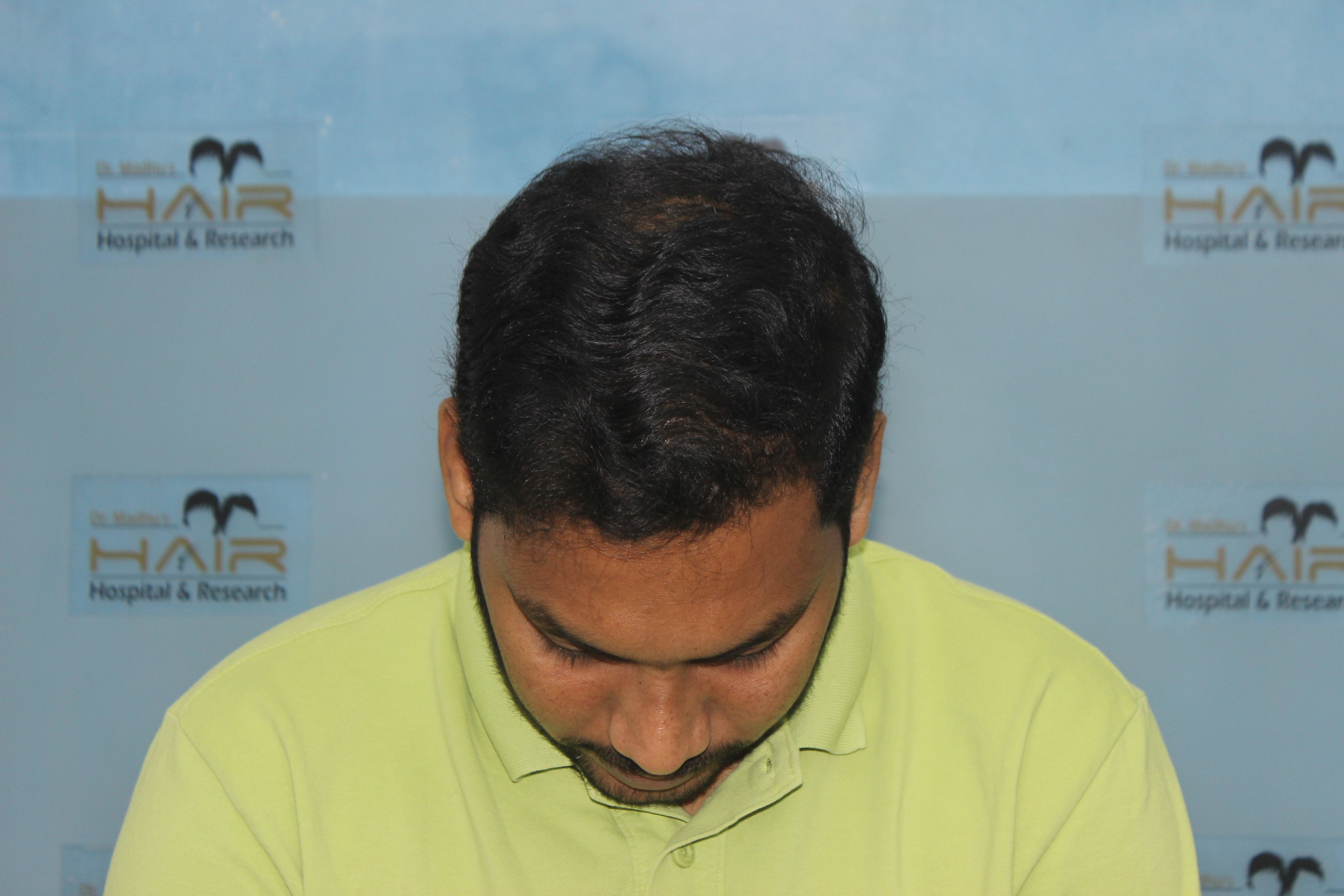 smiling woman wearing brown scarf and maroon coat on snow field