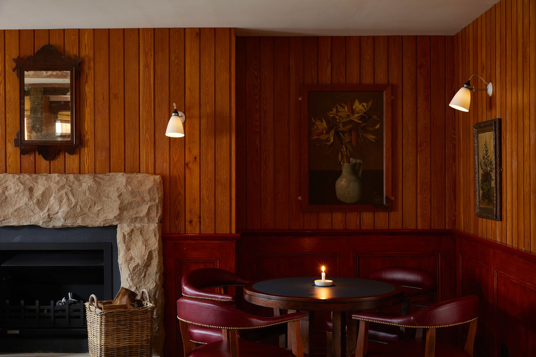The Bear Inn historic pub refurbishment with timber panelling, stone fireplace and bespoke joinery by Matrix IDC