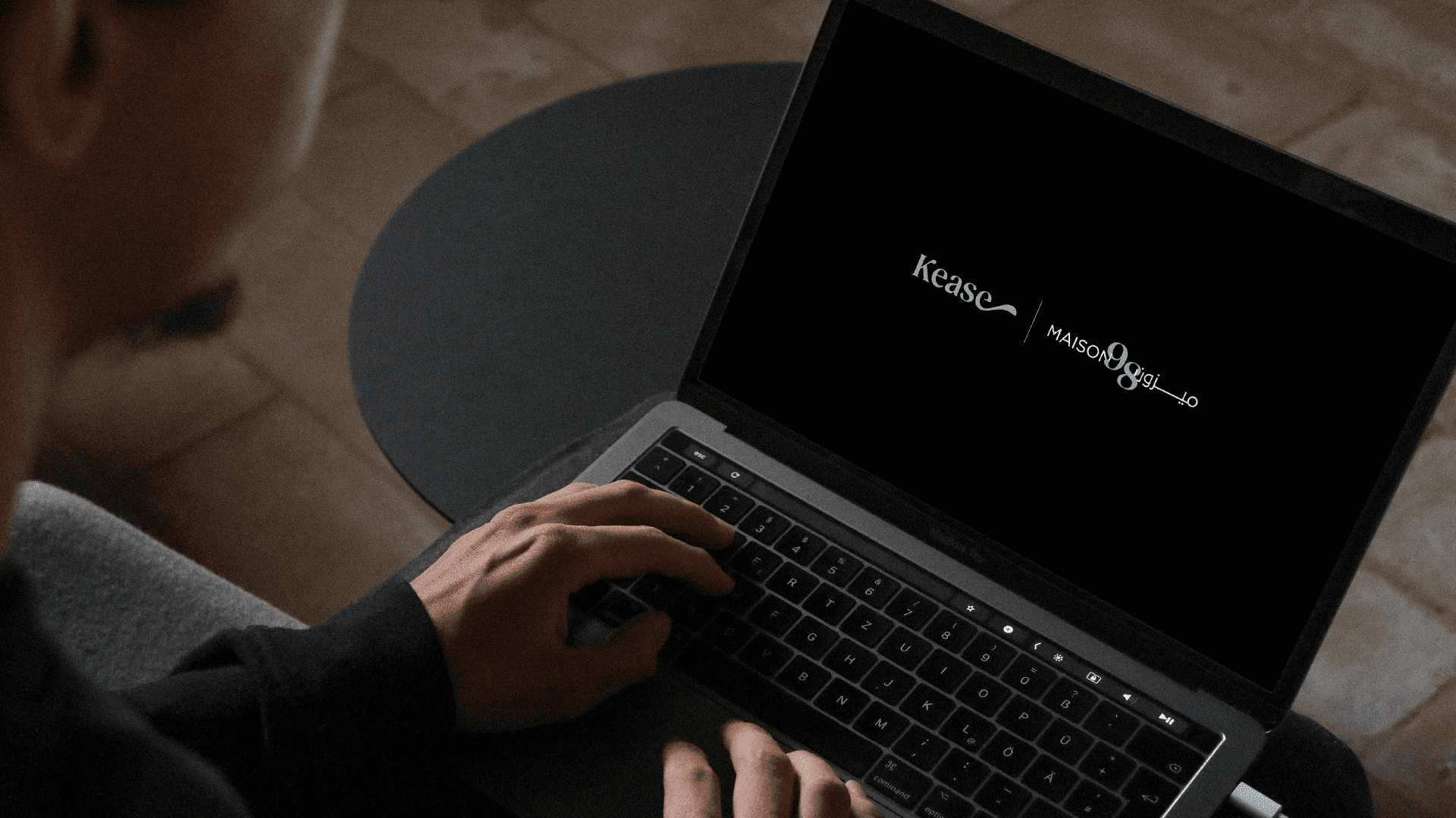 A dirty, old white car with a parking ticket.