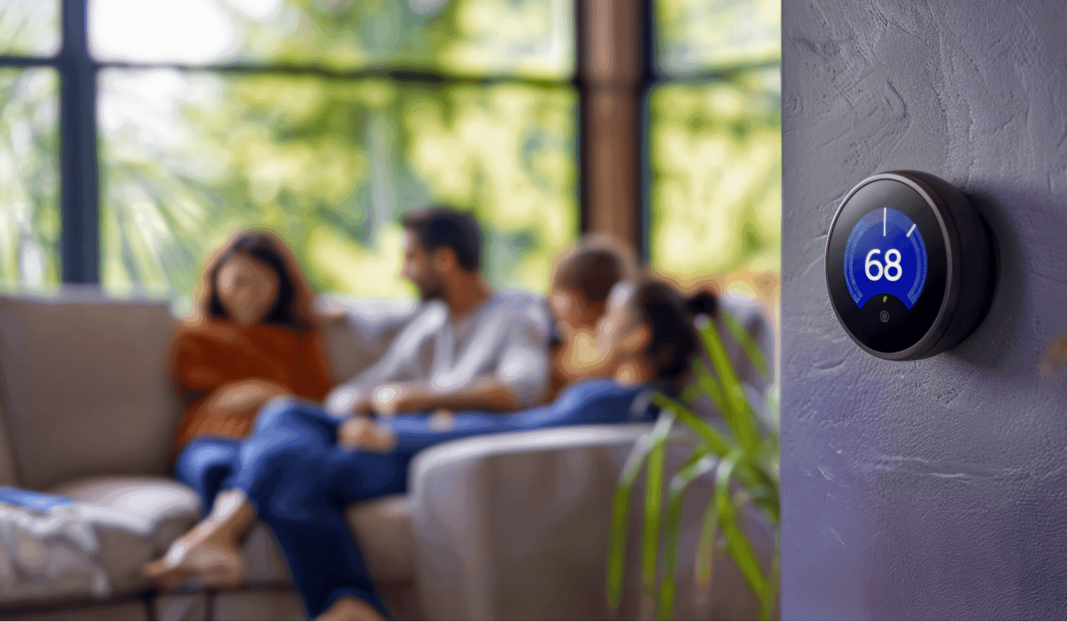 Happy family adjusting a thermostat to a cool AC temperature in their Wichita home.