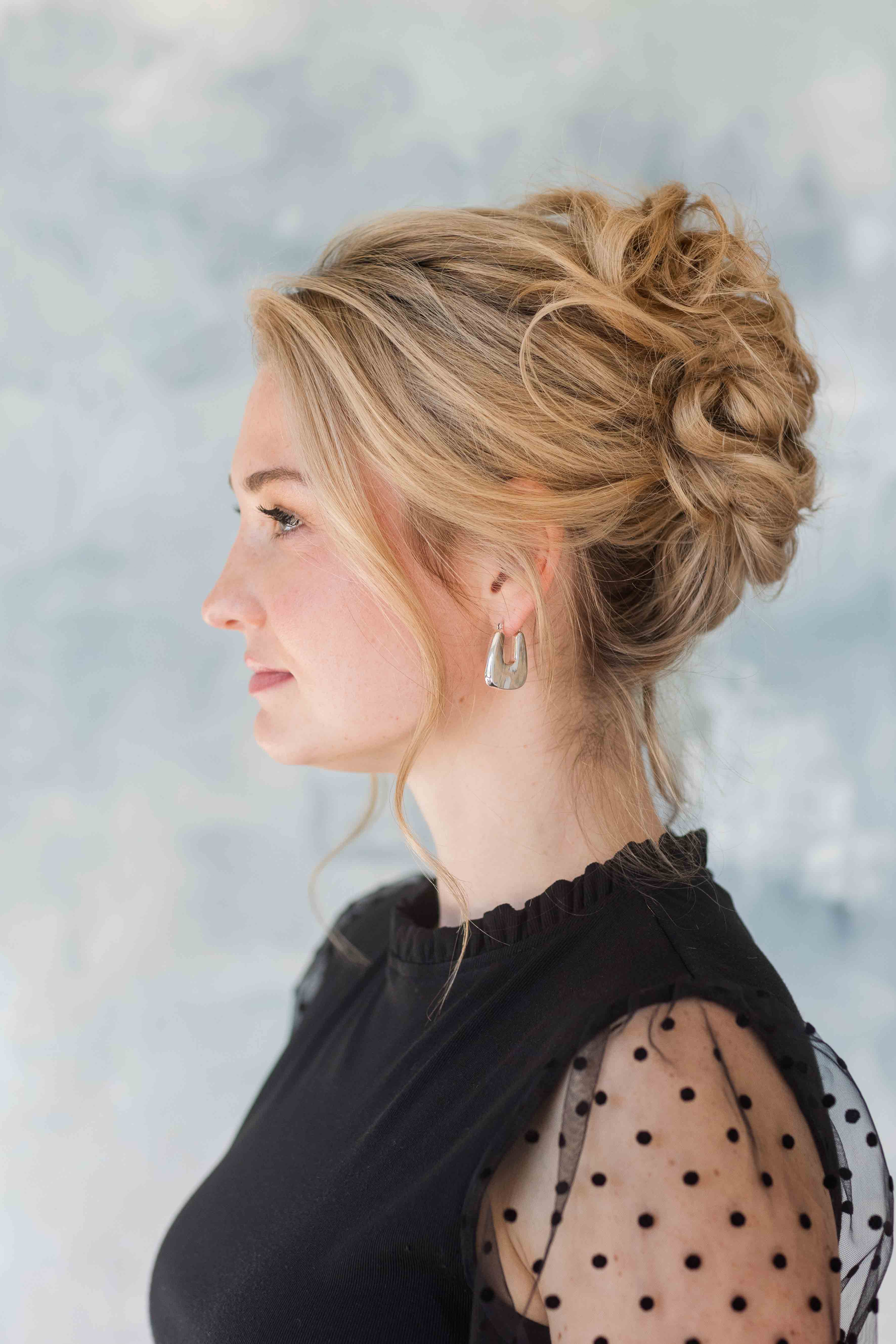 Profile headshot of Rebecca Musayev Nashville Tennessee's luxury wedding and portrait photographer.