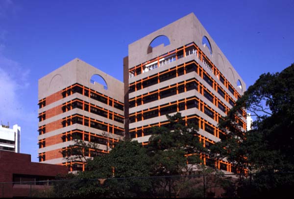 a building with trees and plants