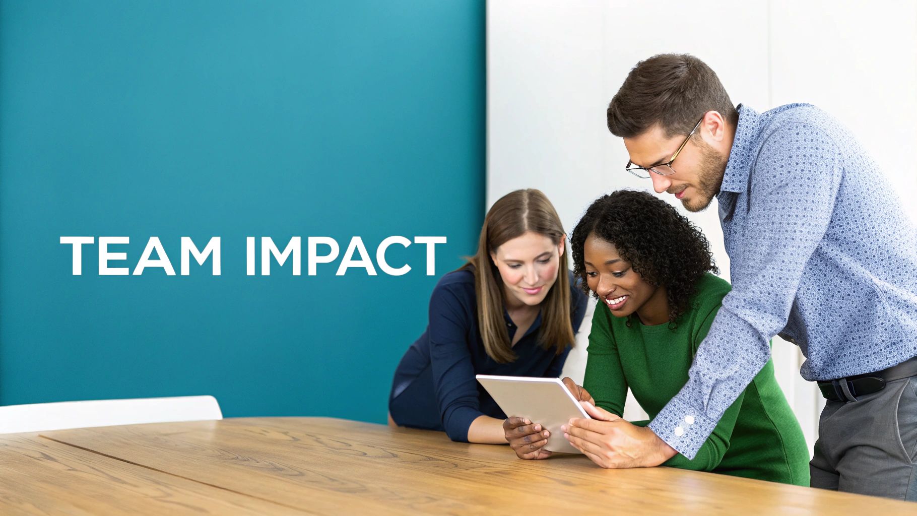 Three diverse colleagues collaborate on a tablet, showcasing teamwork and impact in an office setting.