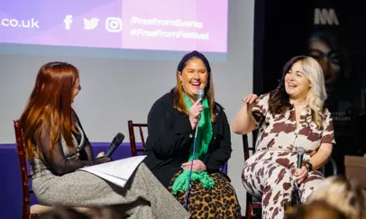 free from festival speaker pannel with women laughing