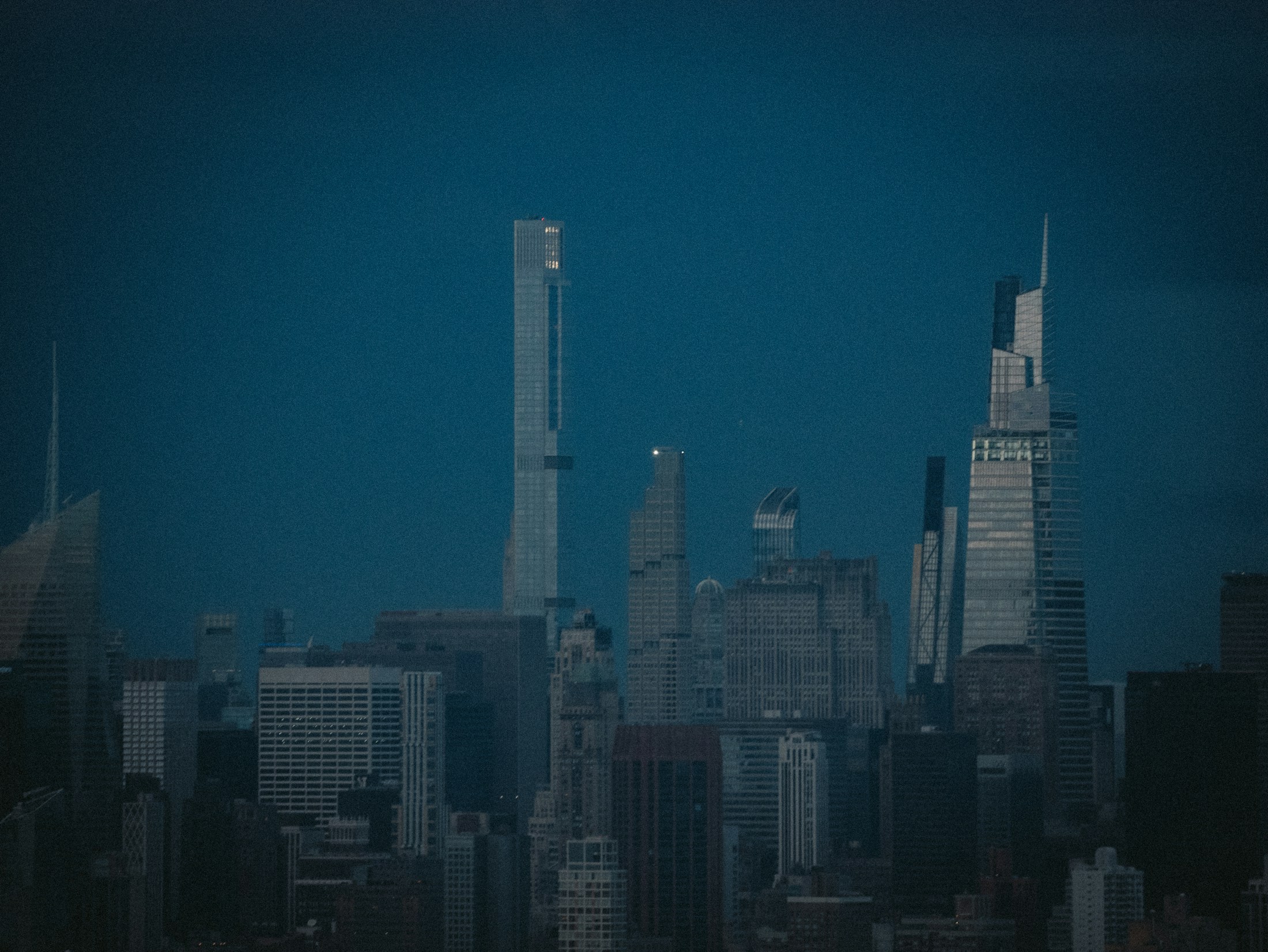 Dark city skyline at dusk
