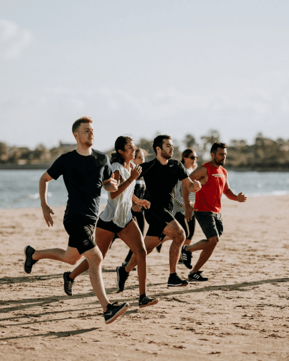 man in workout clothes doing horizontal step workout