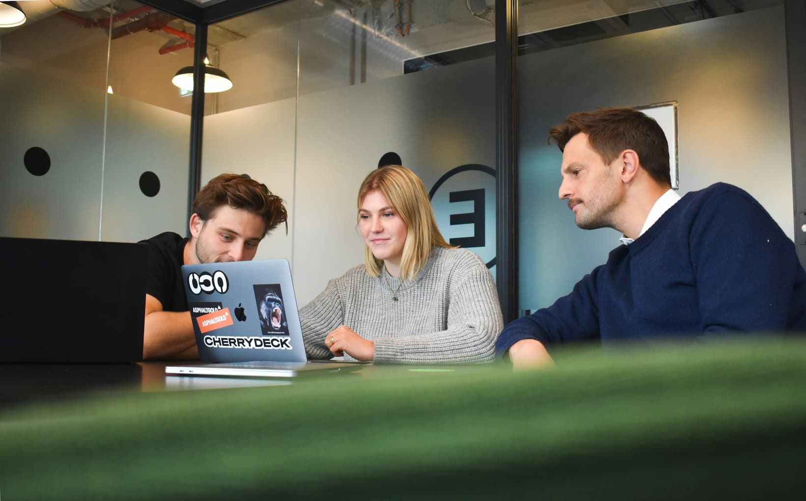 Fourthogo founders collaborating during the company's growth phase