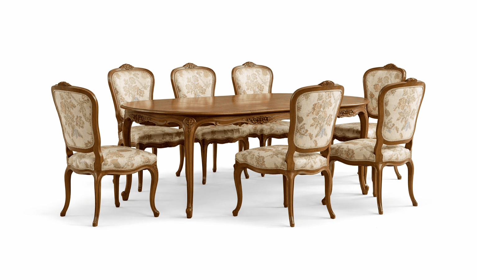 Oval wooden dining set with carved edges and floral upholstered dining chairs