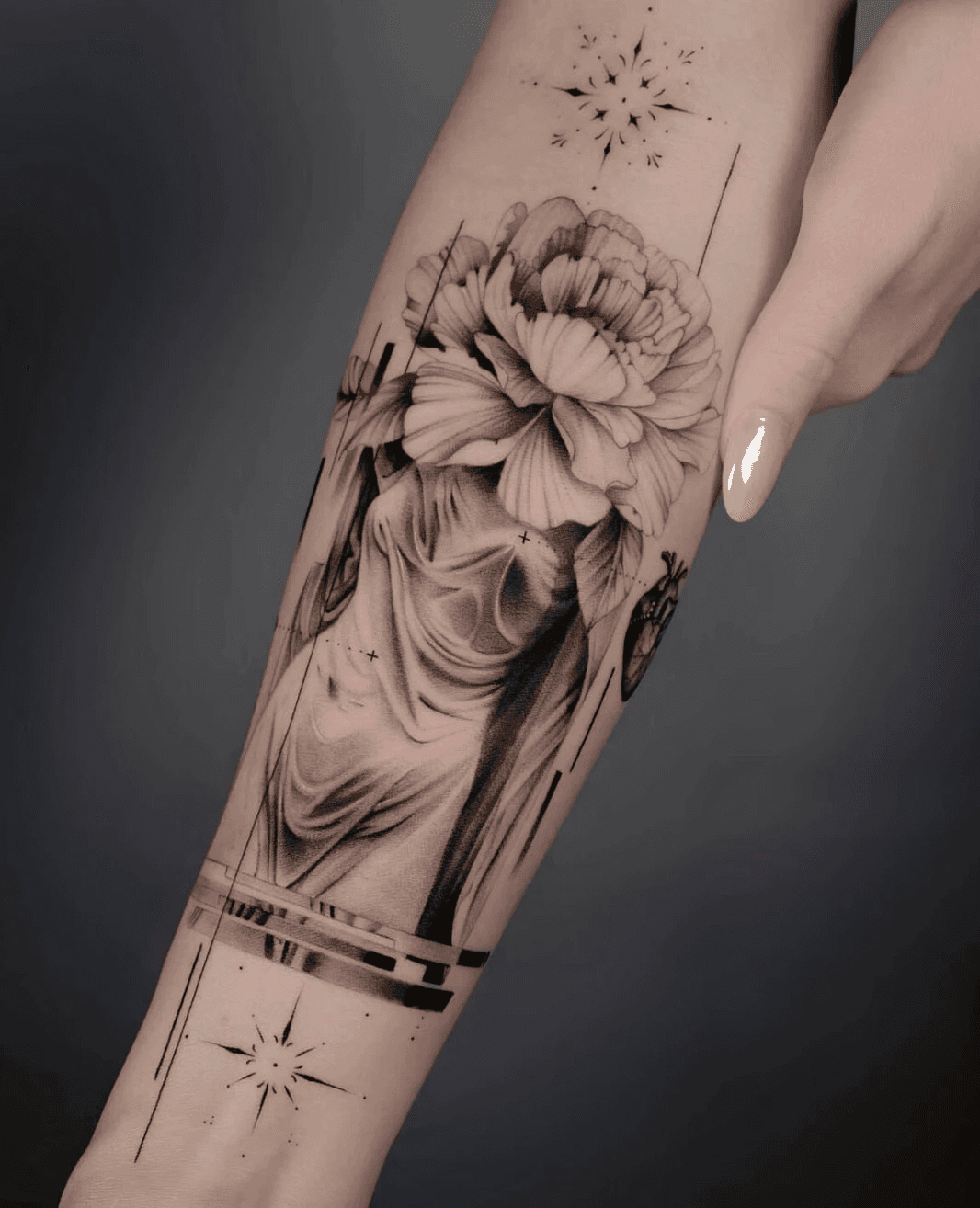 Statue-inspired tattoo featuring peony flower and sacred heart.