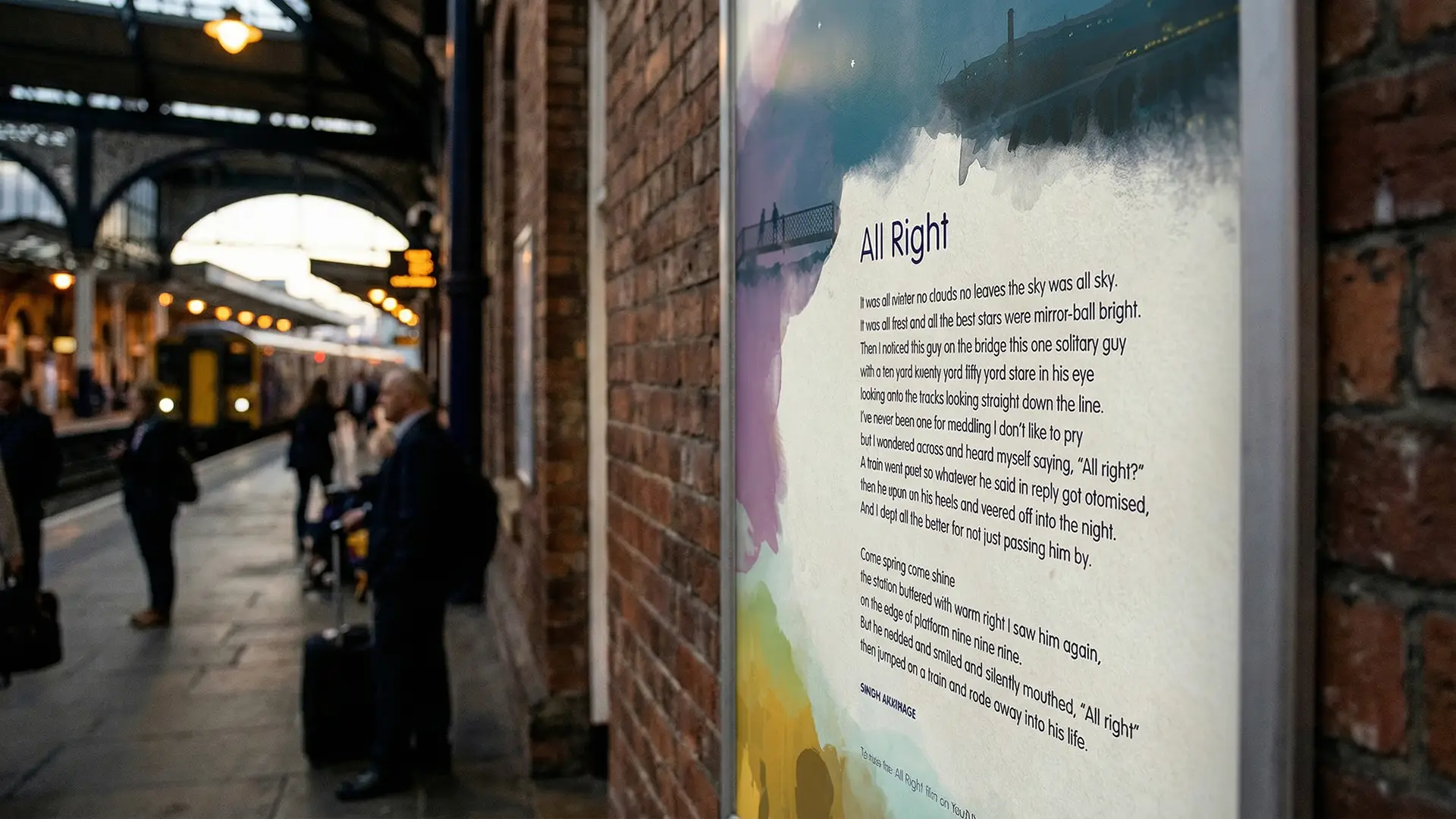 Poster displayed on a railway platform featuring the poem “All Right” by Simon Armitage, encouraging people to check on others.