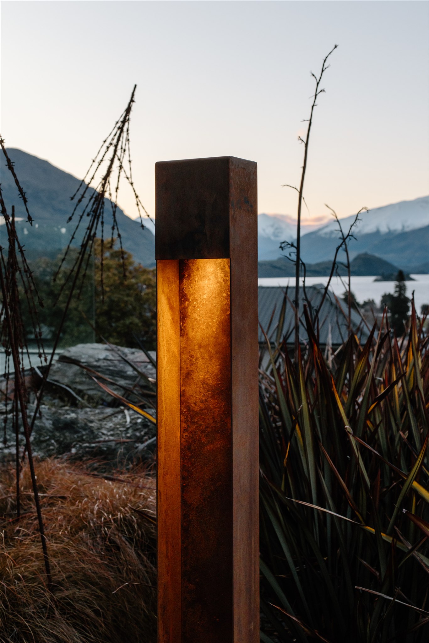 outdoor bollard light in alpine setting dawn