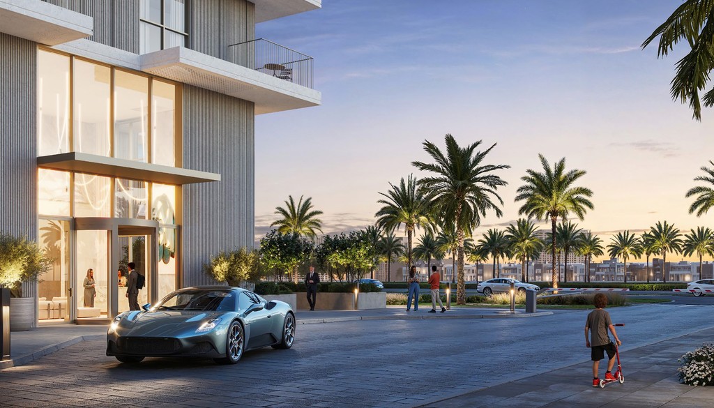 Car parked outside Parkland building: surrounded by trees and palm trees, clear sky, hotel structure on road.