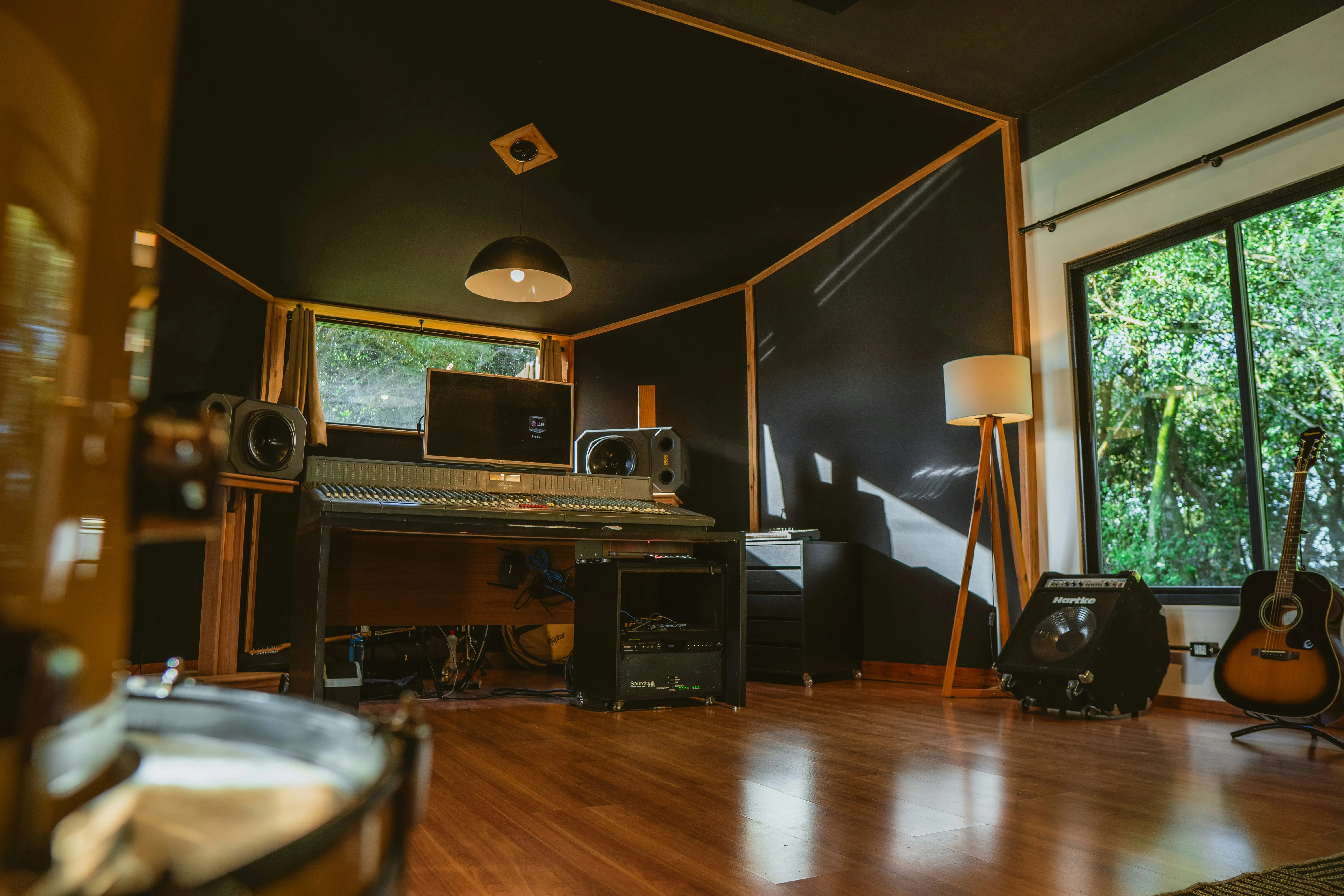 A recording studio with instruments and equipment.