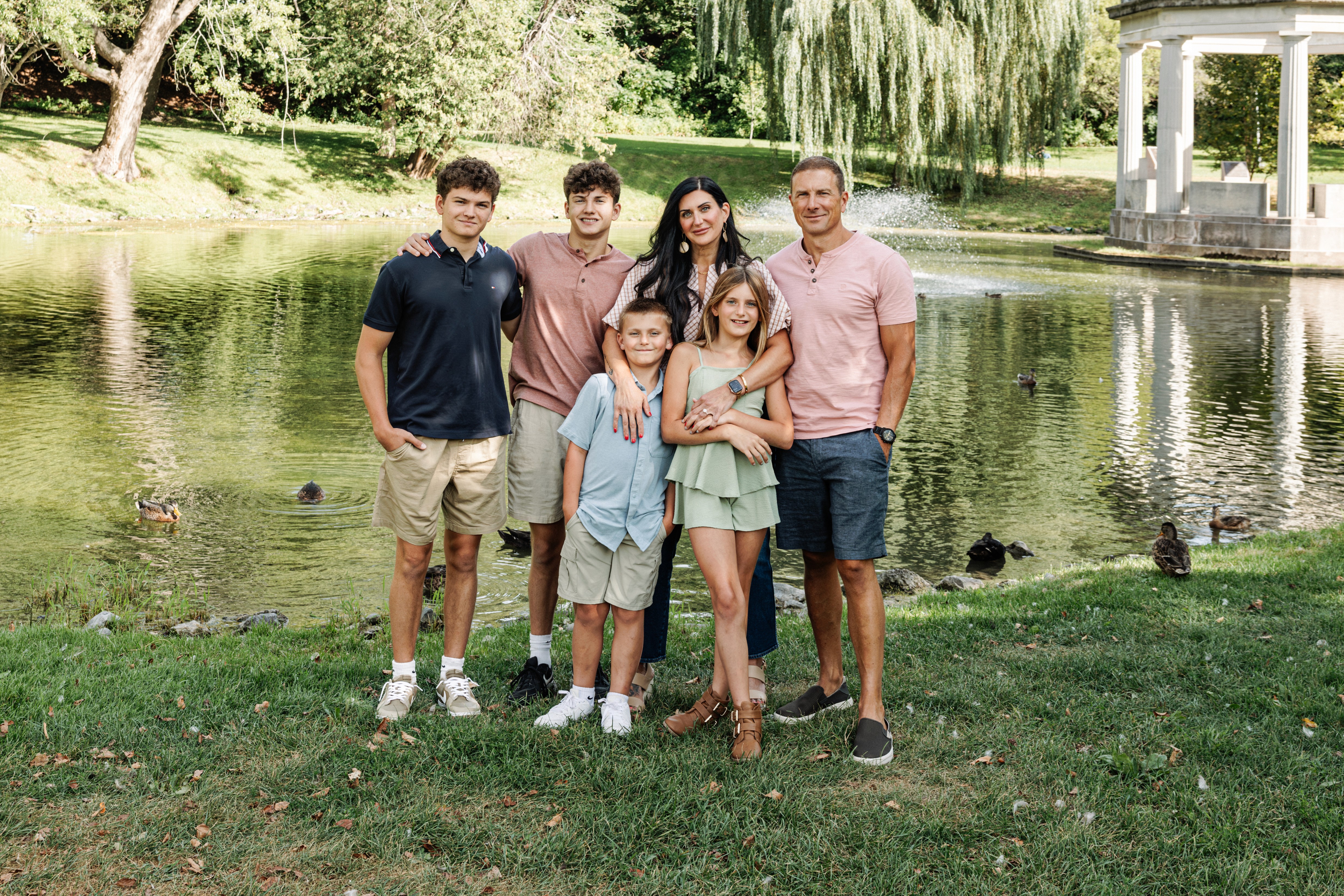 4:59 PMCouple caught in a genuine laugh on the stairs at Bethesda Fountain in Central Park, NYC — fun, unposed couples photography by Lizz Spano Photography, New York City couples photographer.