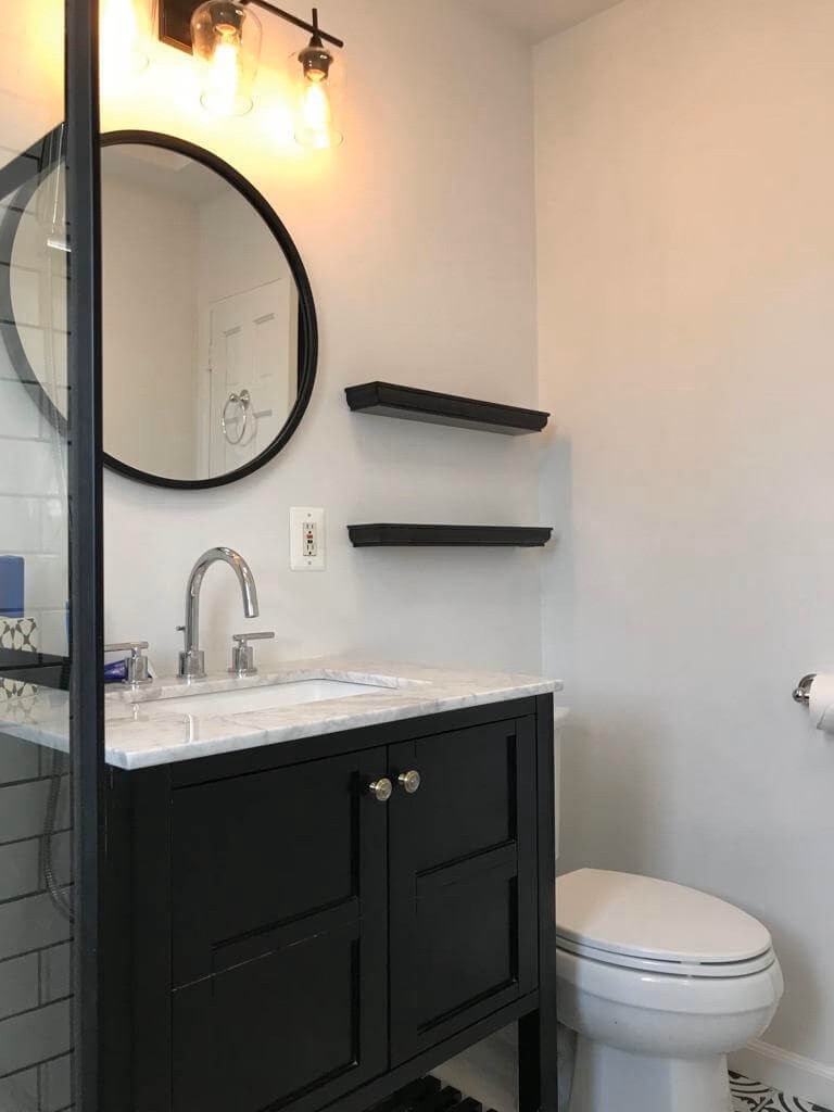 Custom theme bathroom completed by Jewel Construction in Queens