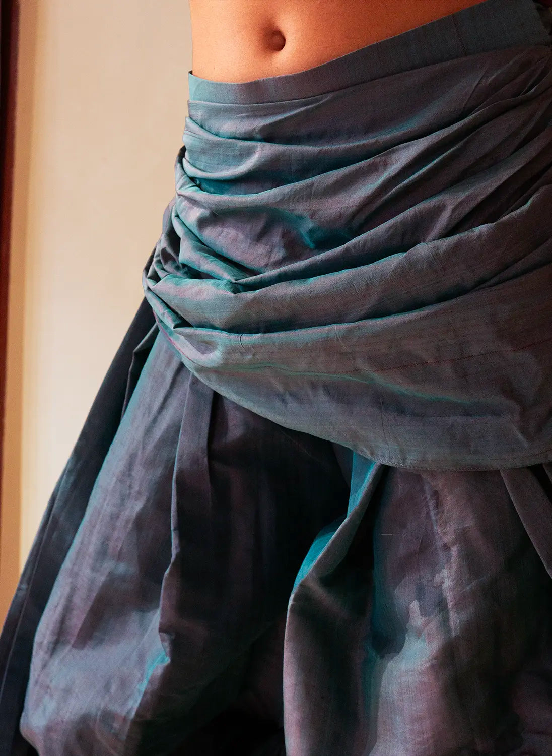 Antariya is a one of a kind drape pant, handcrafted in house from repurposed pure silk and saree borders. 