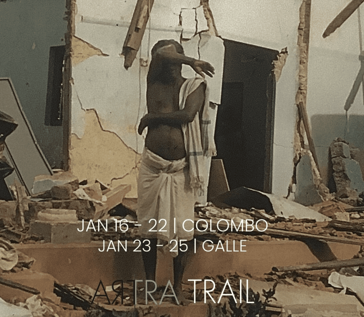 a group of women standing on top of a sandy beach