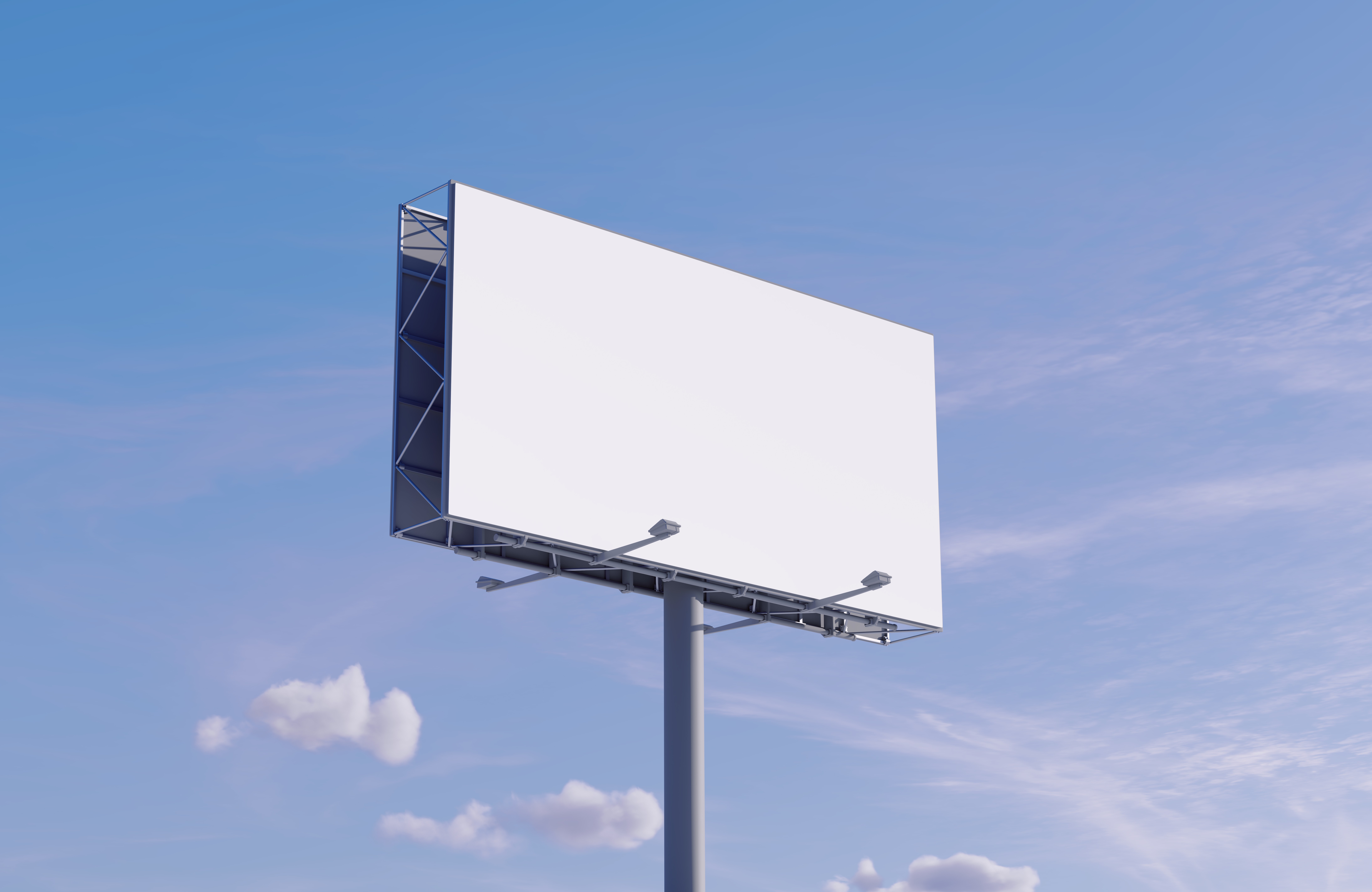 Close-up of a sketchbook showing hand-drawn website wireframes with a phone and pen on the table