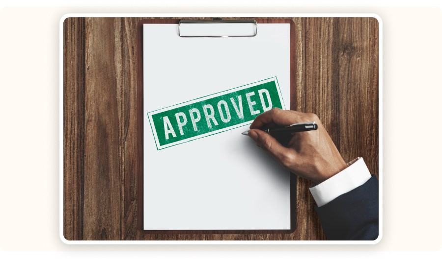 Clipboard stamped “APPROVED”