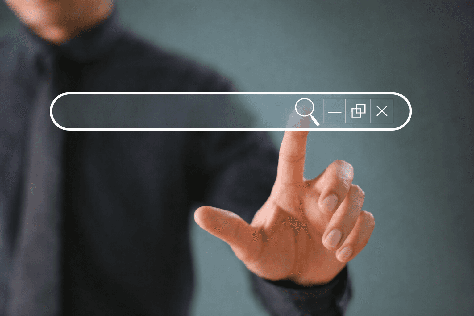 A person clicks the search icon in an overlayed search field with his finger.