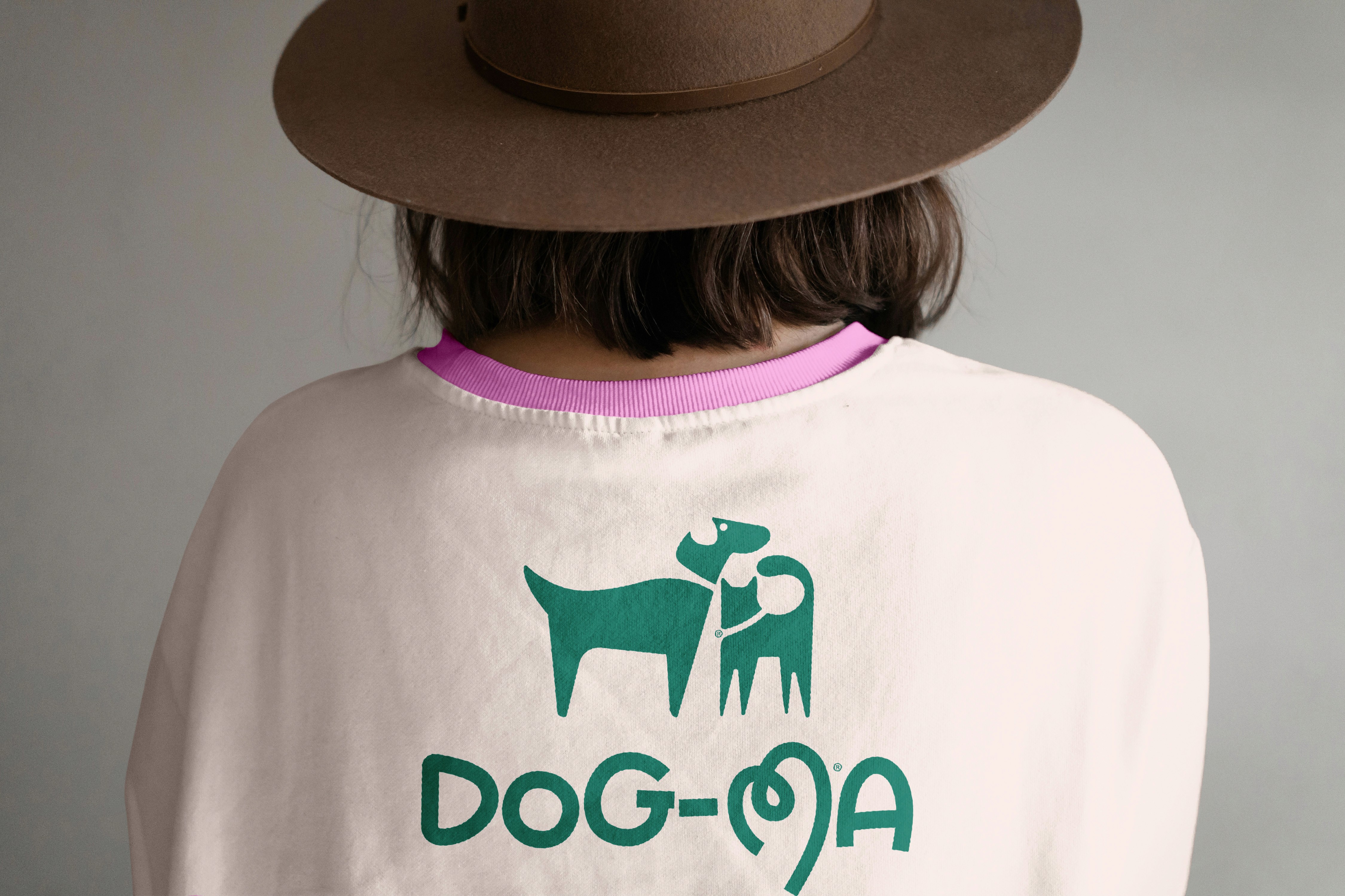 twins posing in front of a car