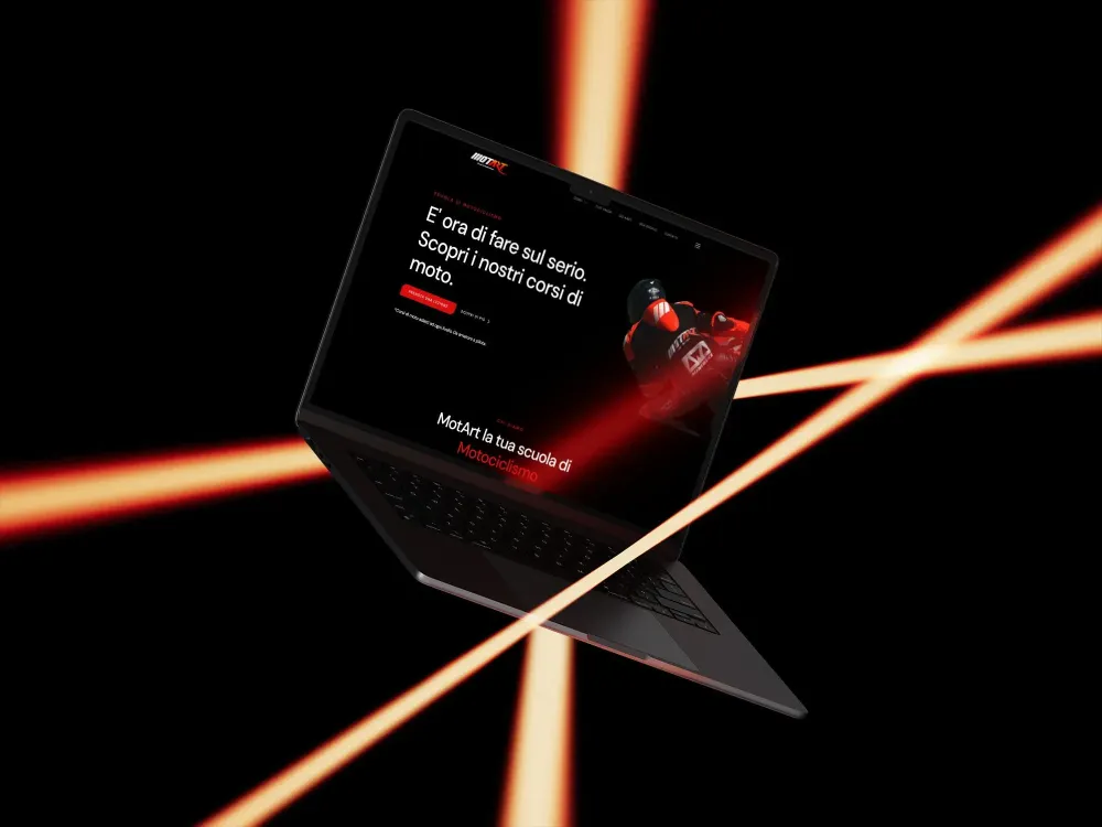 A sleek laptop is displayed against a dark background, illuminated by dynamic orange light streaks.