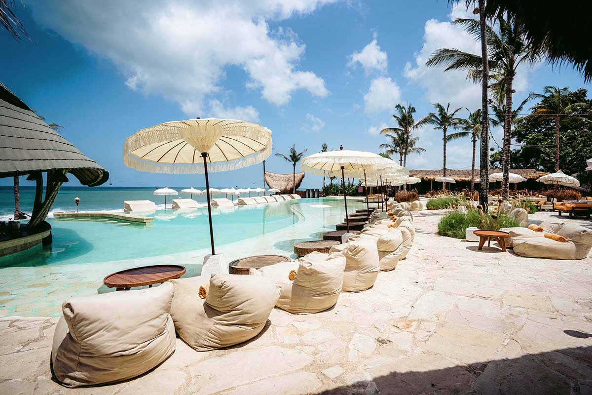 Luxury beach club amenities in Kerobokan. Consult our real estate agents for premium lifestyle property investments.