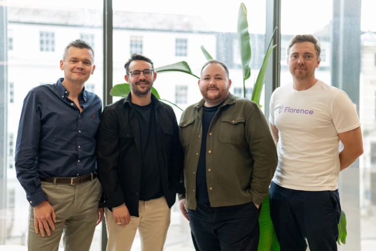 Four men posing together for a group photo outdoors, representing the Florence and Tech Canal partnership teams